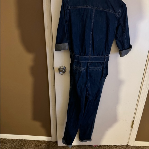 Jean jump suit with pocket and zips - Picture 4 of 5